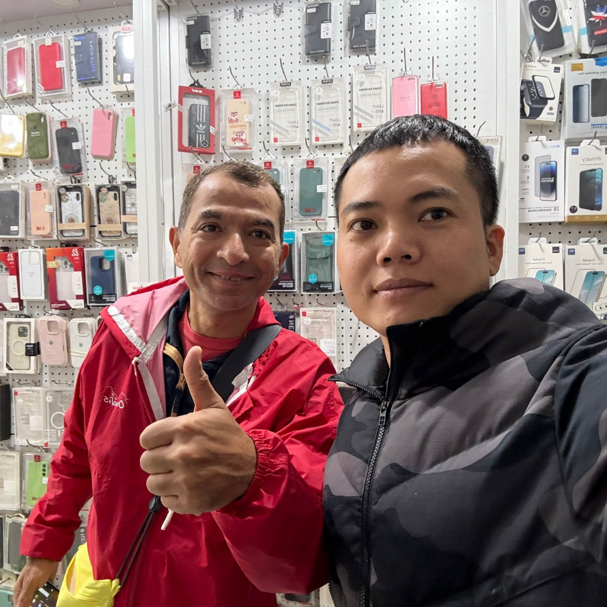 Customer visiting the Smartphone Accessories store for device service consultation