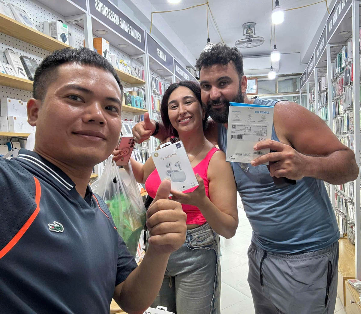 International customers visiting the store for phone accessories