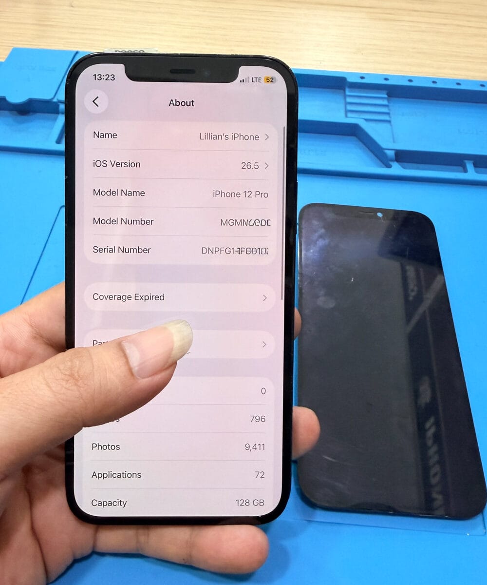 iPhone 12 Pro with fully restored OLED display after professional screen replacement