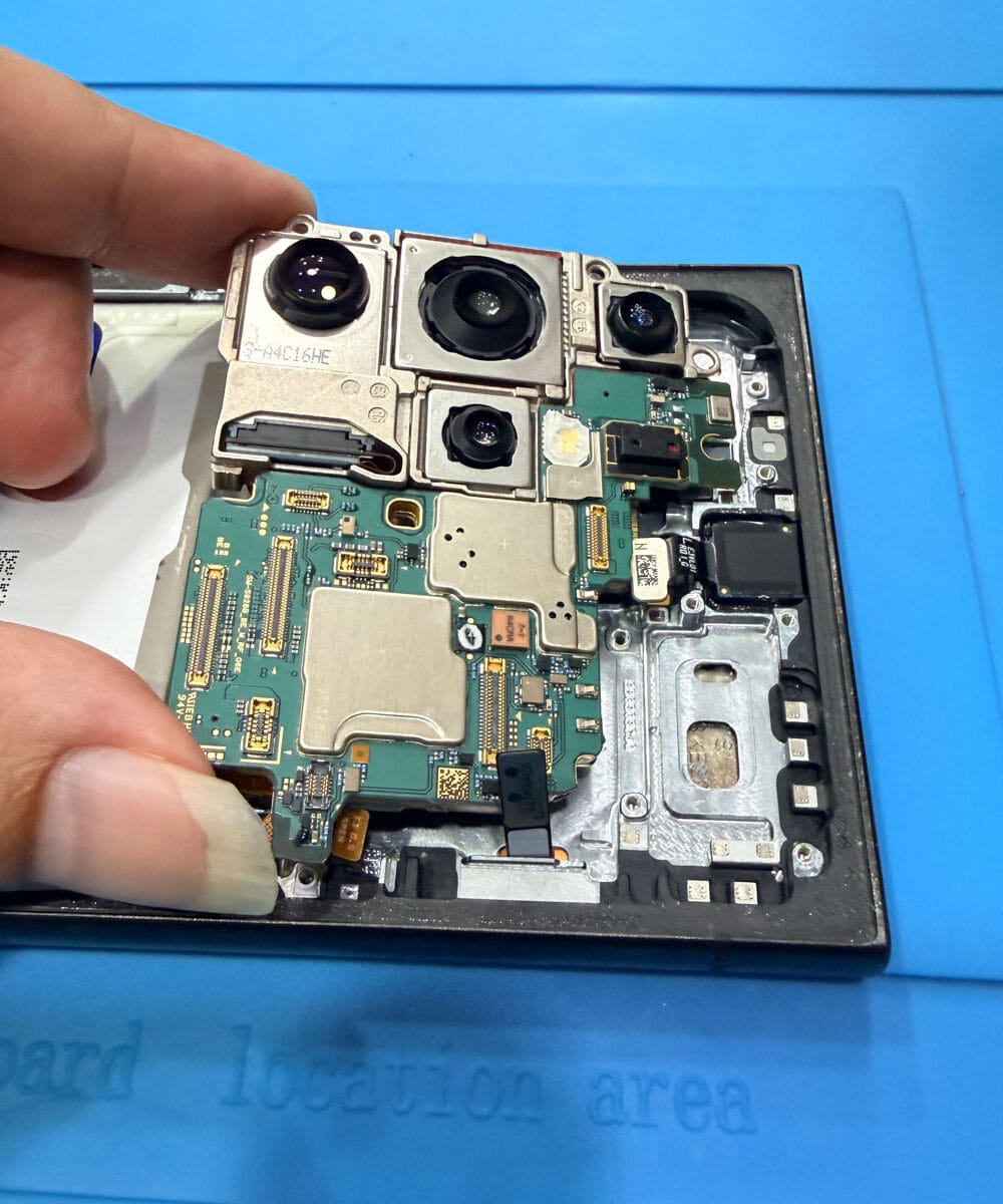 Samsung Galaxy S24 Ultra rear camera being tested after replacement