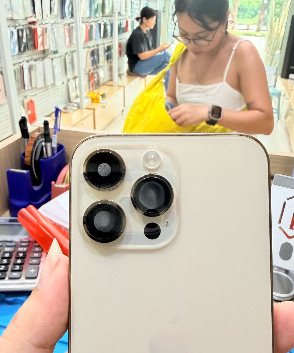 iPhone 14 Pro Max with visible moisture signs after water exposure before repair inspection